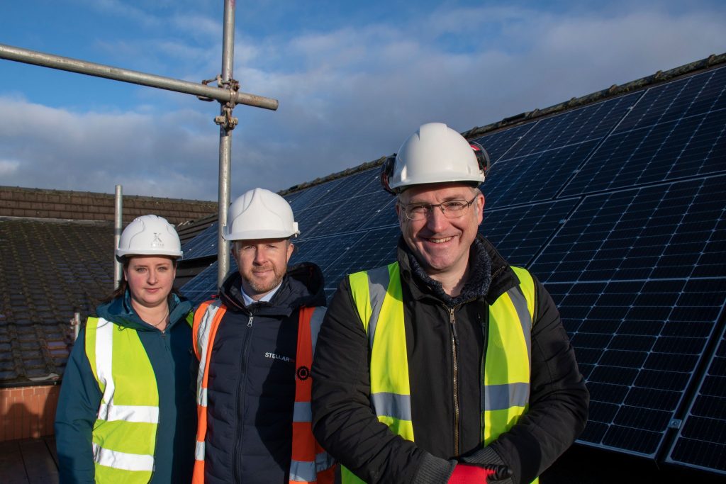 Matt Relf at a solar panel installation. Other staff pictured do not necessarily support Matt's campaign.